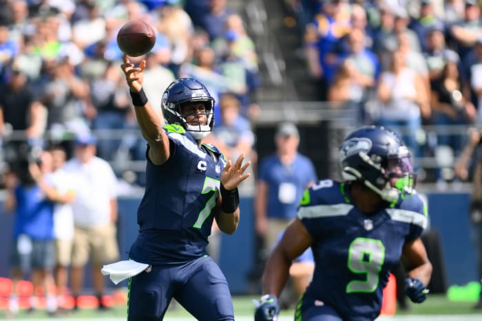 Sep 10, 2023; Seattle, Washington, USA; Seattle Seahawks quarterback Geno Smith (7) passes the ball against the Los Angeles Rams during the first half at Lumen Field. Mandatory Credit: Steven Bisig-USA TODAY Sports